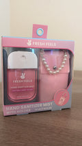 Hand sanitizer with holder